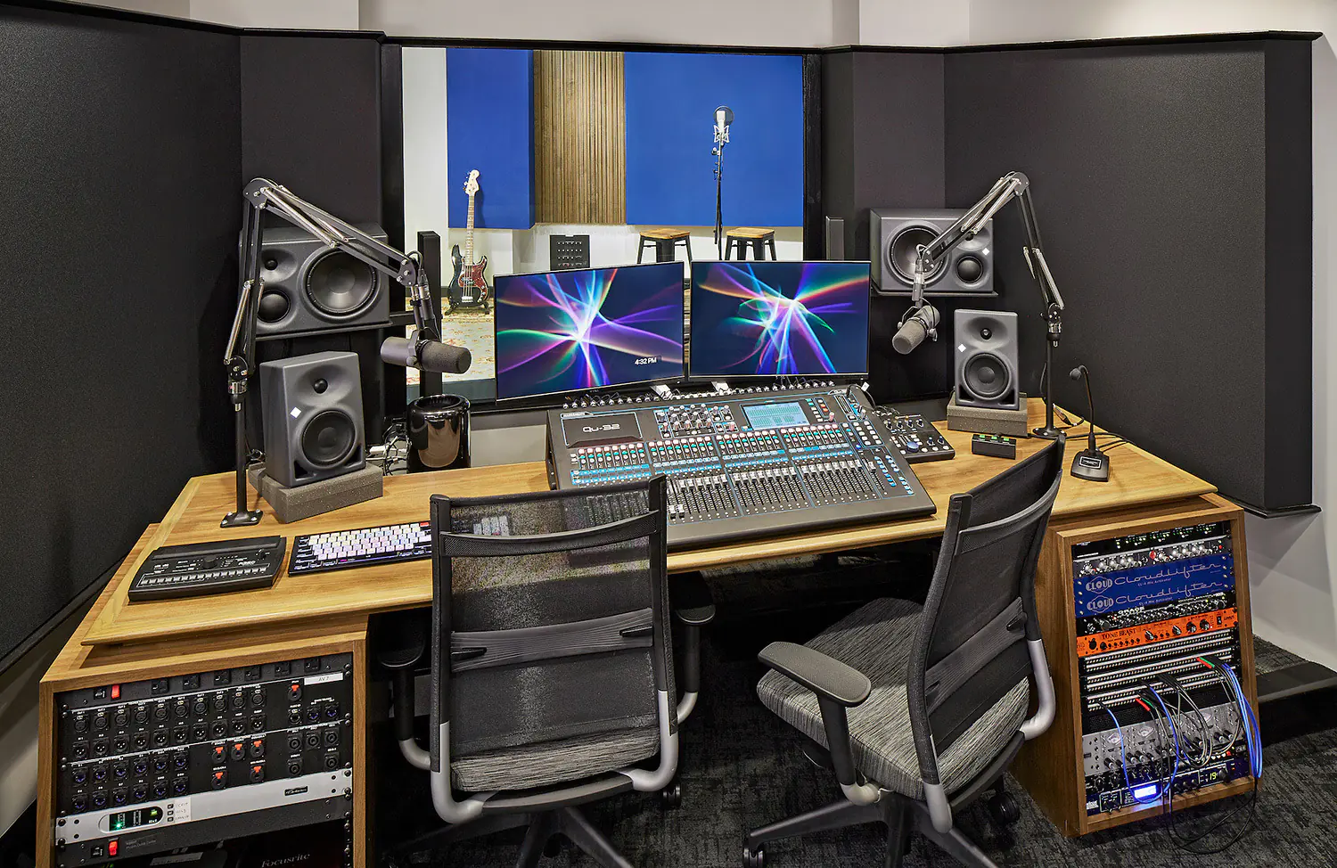 Podcast Audio Visual Services studio monitoring headphones placed on mixing desk during professional podcast recording session.